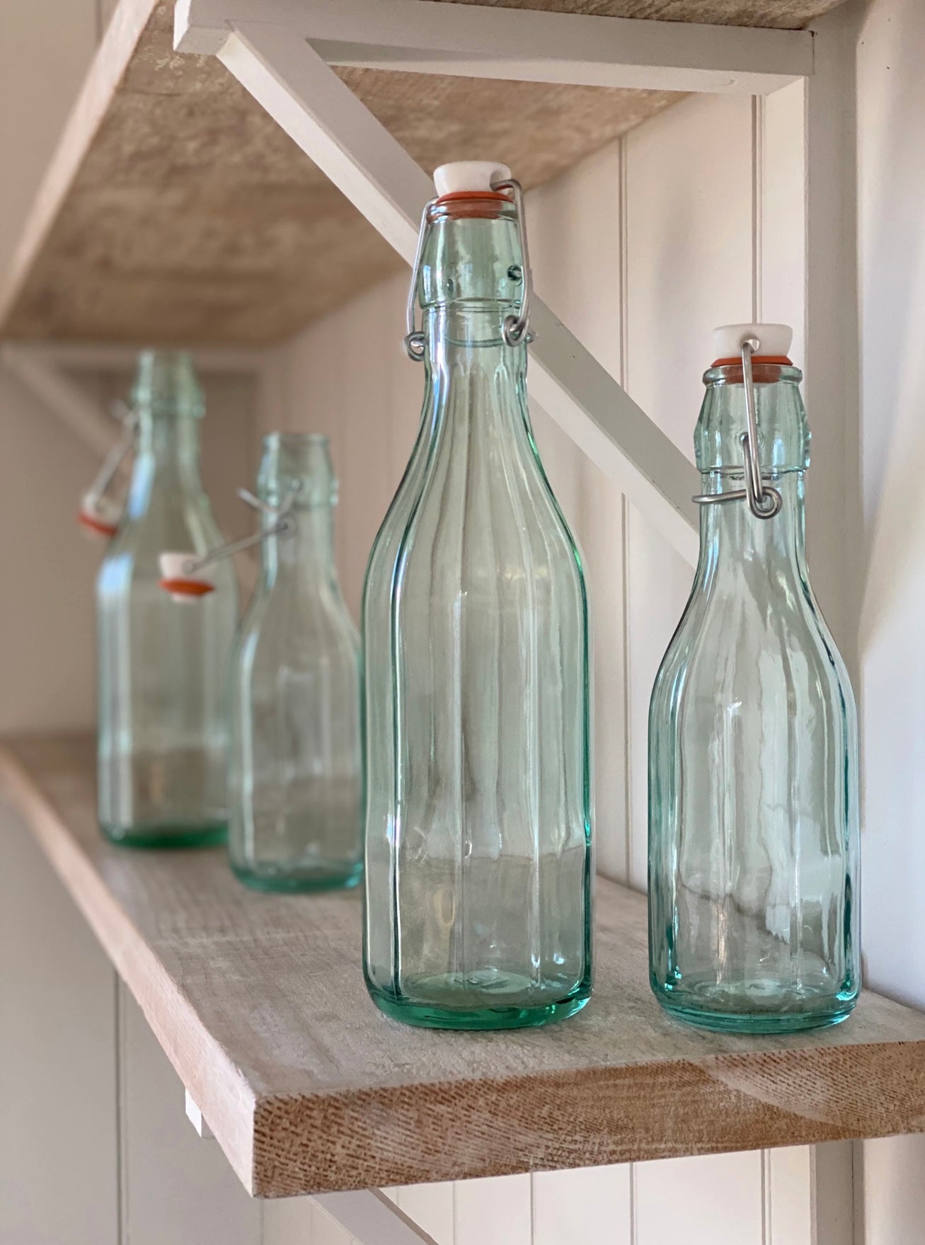 Faceted Bottle with Swing Top Lid