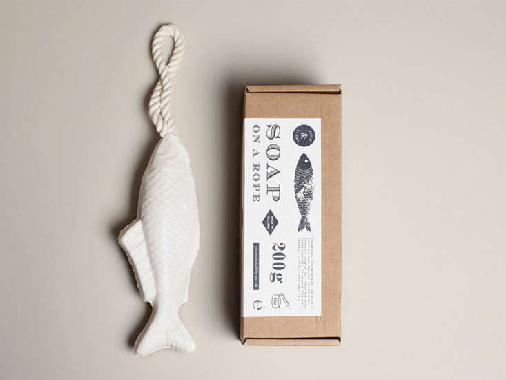 white fish shaped soap on a rope boxed in a kraft card box